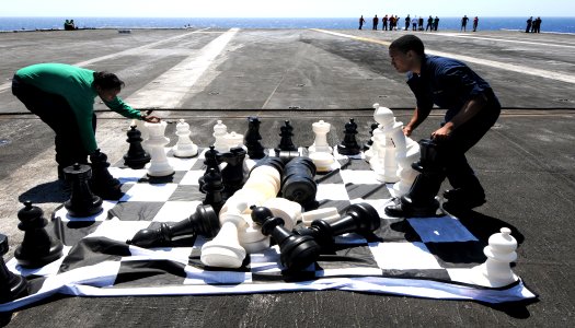 US Navy 100703-N-5085J-010 Aerographer's Mate Airman Shane Nassey, right, and Logistics Specialist Seaman Marlena Russel