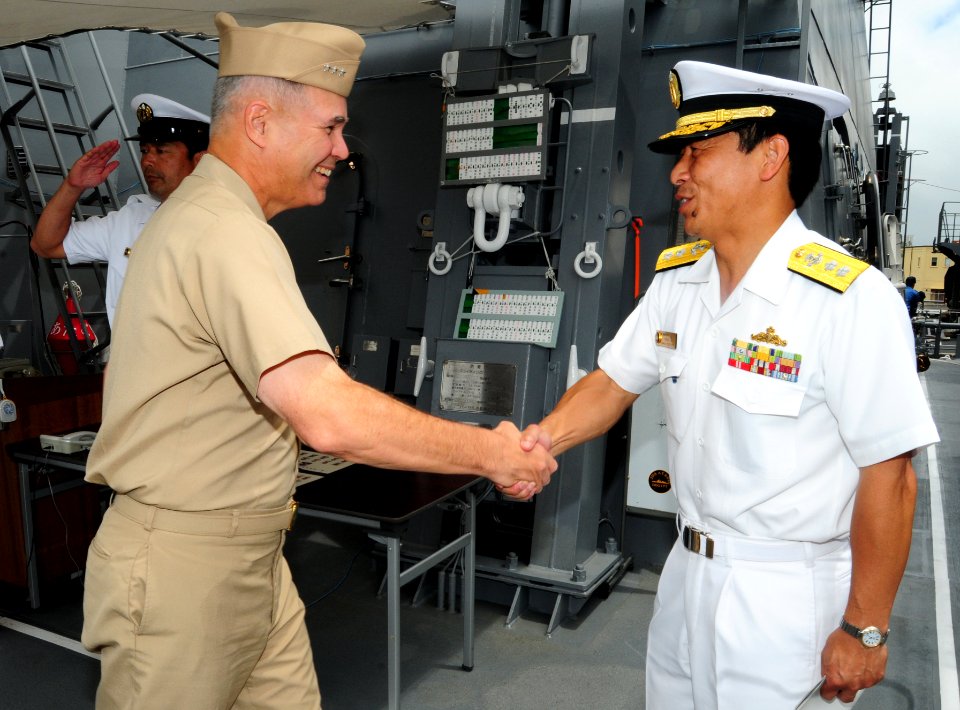 US Navy 100629-N-3570S-007 Japan Maritime Self-Defense Force Rear Adm. Kazuki Yamashita welcomes Vice Adm. Richard W. Hunt aboard the Japan Maritime Self-Defense Force guided-missile destroyer JS Atago (DDG 177)