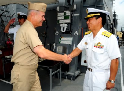 US Navy 100629-N-3570S-007 Japan Maritime Self-Defense Force Rear Adm. Kazuki Yamashita welcomes Vice Adm. Richard W. Hunt aboard the Japan Maritime Self-Defense Force guided-missile destroyer JS Atago (DDG 177)