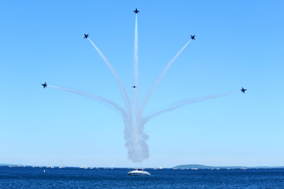 US Navy 100703-N-0092J-198 Pilots assigned to the U.S. Navy flight demonstration squadron, the Blue Angels, perform the low break cross maneuver during the National Cherry Festival Air Show