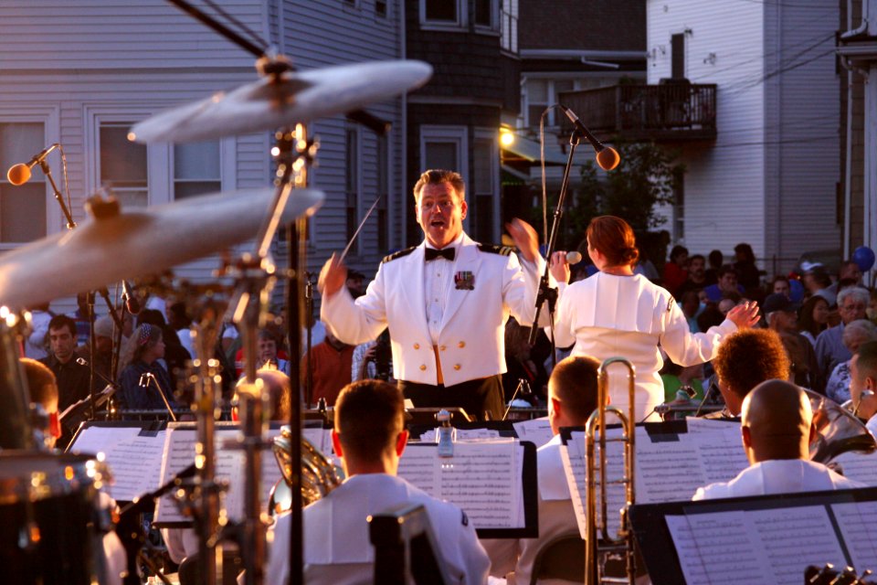 US Navy 100701-N-3038C-220 Lt. Carl Gerhard leads the U.S. Navy Band Northeast, Pop Ensemble, during a performance as part of Boston Navy Week 2010