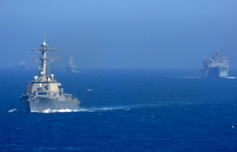 US Navy 100703-N-4236E-393 he guided-missile destroyer USS Carney (DDG 64) and other ships from Carrier Strike Group (CSG) 8