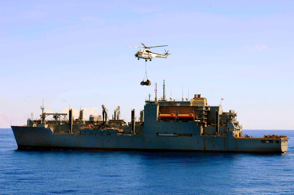 US Navy 100629-N-6410J-032 A Military Sealift Command-contracted SA-330J Puma helicopter transports cargo from the Military Sealift Command dry cargo and ammunition ship USNS Richard E. Byrd (T-AKE 4)