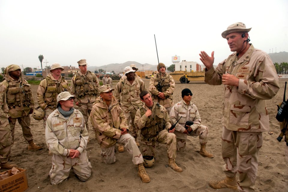 US Navy 100703-N-5319A-035 Warrant Officer Timothy Smith, assigned to Beach Master Unit (BMU) 1, briefs his crew before receiving Landing Craft Utility (LCU) 1617 f