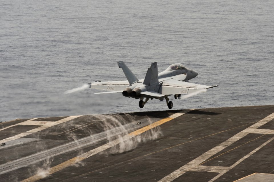 US Navy 100703-N-7317W-012 An F-A-18F Super Hornet assigned to the Swordsmen of Strike Fighter Squadron (VFA) 32 takes off from the flight deck of the aircraft carrier USS Harry S. Truman (CVN 75) during a change of command cer