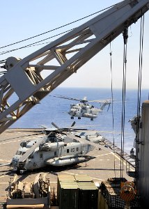 US Navy 100704-N-1082Z-012 A CH-53E Super Stallion helicopter from the Golden Eagles of Marine Medium Tiltrotor Squadron (VMM) 162 (Reinforced), prepares to land aboard the amphibious dock landing ship USS Ashland (LSD 48)