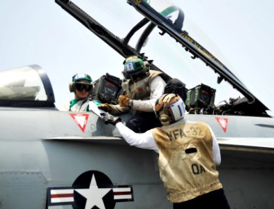 US Navy 100630-N-6003P-118 Aviation Electronics Technician 1st Class Jeffrey Caleb, right, and Aviation Electronics Technician 3rd Class Adam Chenevert conduct an ALE-47 Airborne Countermeasure Dispensing System inspection