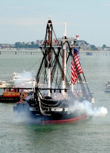 US Navy 100704-N-5647H-389 USS Constitution fires a 21-gun salute toward Fort Independence on Castle Island during the ship's July 4th underway