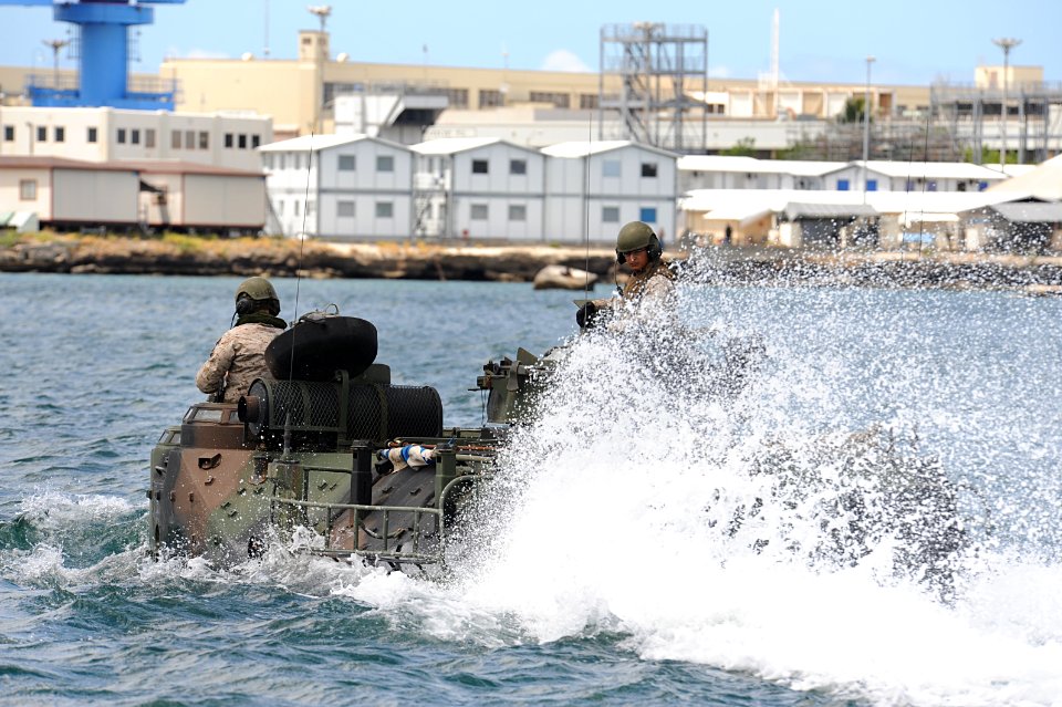 US Navy 100630-N-9500T-191 Marines from the Combat Assault Company of Amphibious Armored Platoon pilot their amphibious assault vehicles through Pearl Harbor during Rim of the Pacific (RIMPAC) 2010