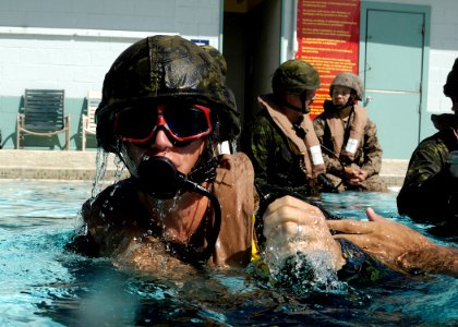 US Navy 100630-O-0000H-004 Lt. Kayne Carr, from Chatham completes shallow water egress training in preparation for Rim of the Pacific (RIMPAC) 2010 exercise