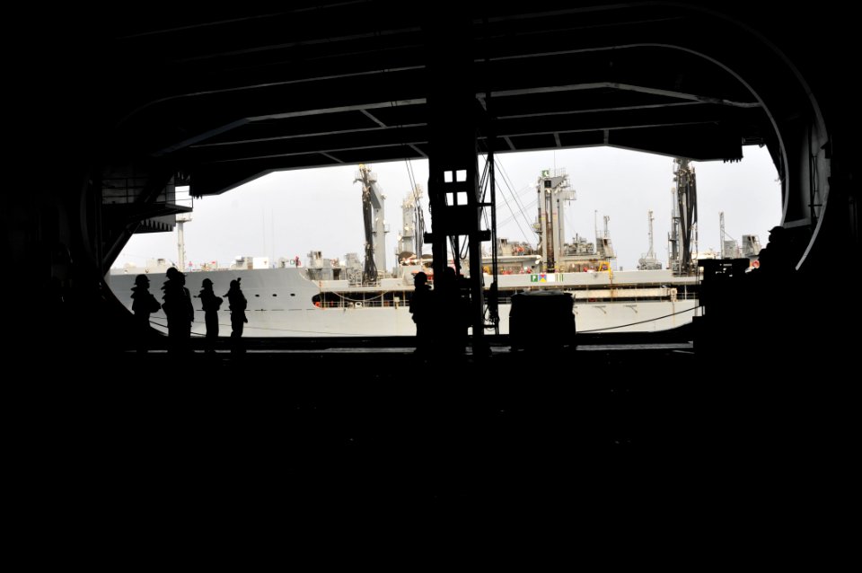 US Navy 100701-N-8102J-022 Sailors aboard the aircraft carrier USS Harry S. Truman (CVN 75) conduct a replenishment at sea