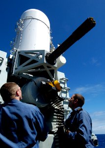 US Navy 100706-O-XXXXX-018 Leading Seaman Shawn Smalldridge, left, and Leading Seaman Randy Melanson load rounds into the close-in-weapon system aboard HMCS Calgary (FFH 335)