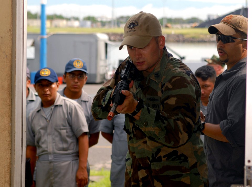 US Navy 100707-N-4971L-061 Equipment Operator 1st Class Daniel Lasich, center, assigned to the High Speed Vessel Swift (HSV 2) conducts close combat tactics drills with members of the Guatemalan armed forces