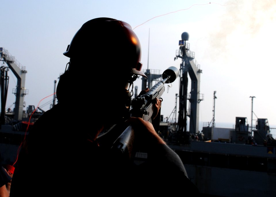 US Navy 100707-N-2908M-071 Gunner's Mate 3rd Class Ralph Carey fires a 7.62 mm rifle grenade cartridge
