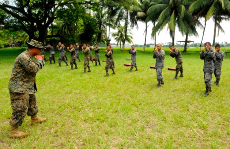 US Navy 100708-N-9643W-101 Sgt. Juan Martinez demonstrates a front jab to a group of sailors from the Guatemalan navy