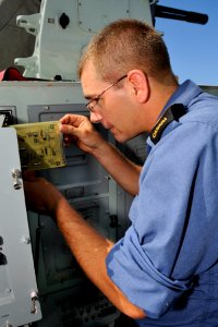 US Navy 100708-O-0000S-081 Master Seaman Shawn Zweers troubleshoots the Close-In Weapons System aboard HMCS Algonquin (DD 283)