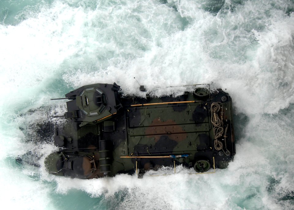 US Navy 100707-N-8283S-179 An amphibious assault vehicle (AAV) launches from the well deck of the amphibious assault ship USS Boxer (LHD 4)