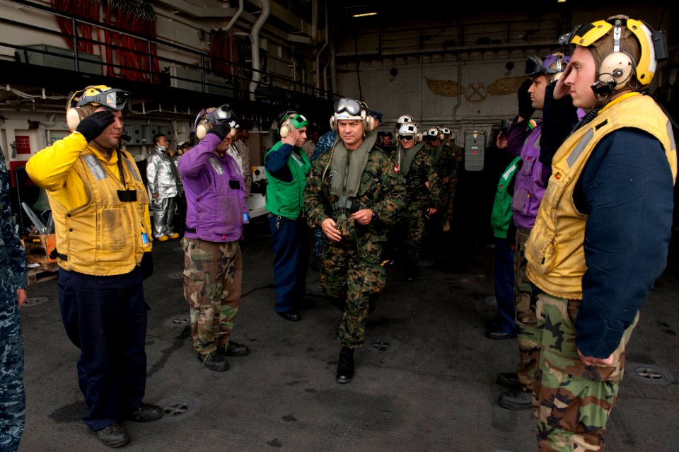 US Navy 100709-N-5319A-148 Senior Peruvian officers walk through rainbow sideboys after touring USS New Orleans (LPD 18)