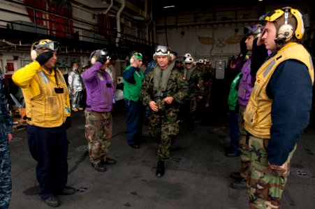 US Navy 100709-N-5319A-148 Senior Peruvian officers walk through rainbow sideboys after touring USS New Orleans (LPD 18)