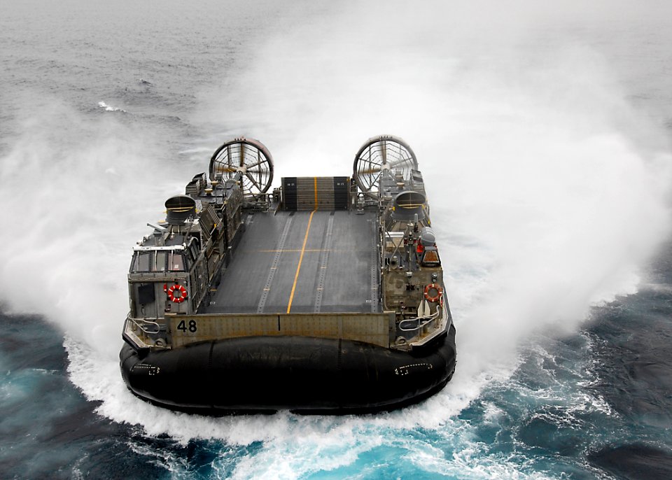 US Navy 100708-N-8283S-023 A landing craft air cushion prepares to enter the well deck of USS Boxer (LHD 4)