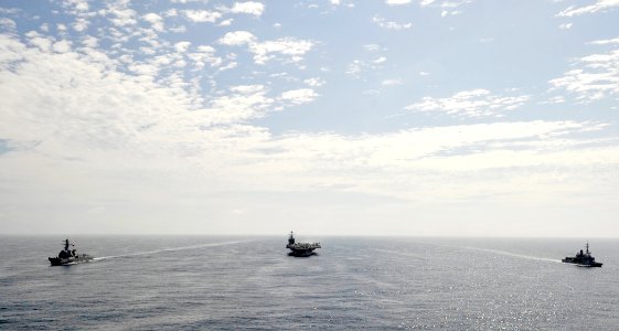 US Navy 100709-N-6003P-210 USS Harry S. Truman (CVN 75), USS Winston S. Churchill (DDG 81) and Jean Bart (D615) cruise in formation after concluding joint air defense interoperability exercises