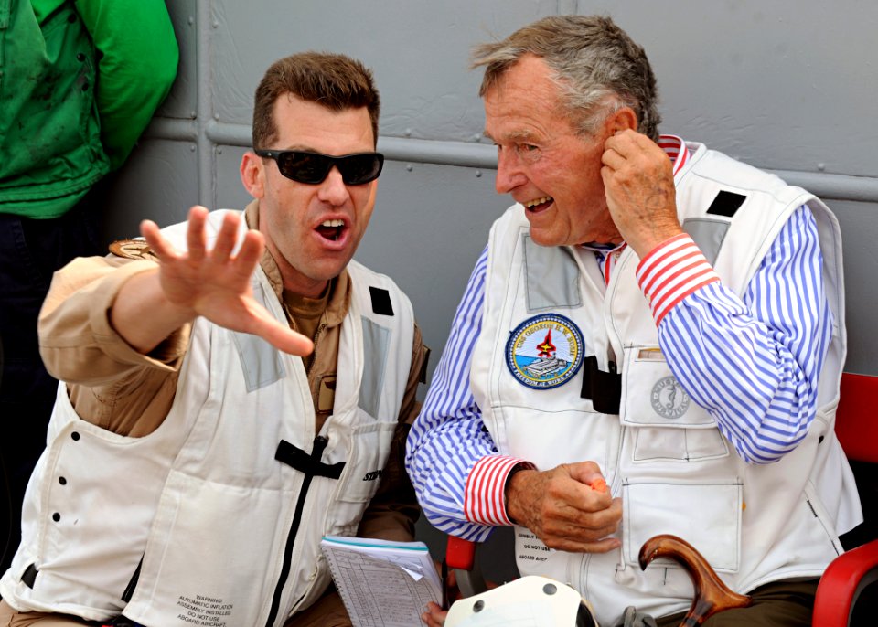 US Navy 100714-N-3885H-169 Former President George H.W. Bush watches flight operations aboard USS George H.W. Bush (CVN 77)