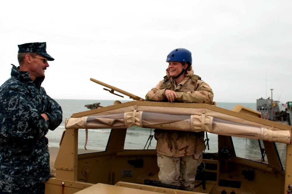 US Navy 100707-N-5319A-072 Capt. Peter Brenann, commodore of Amphibious Squadron (AMPHIBRON) 5, speaks with Boatswain's Mate Seaman Ashleigh Brown, coxswain of a lighter amphibious re-supply cargo (LARC) vehicle