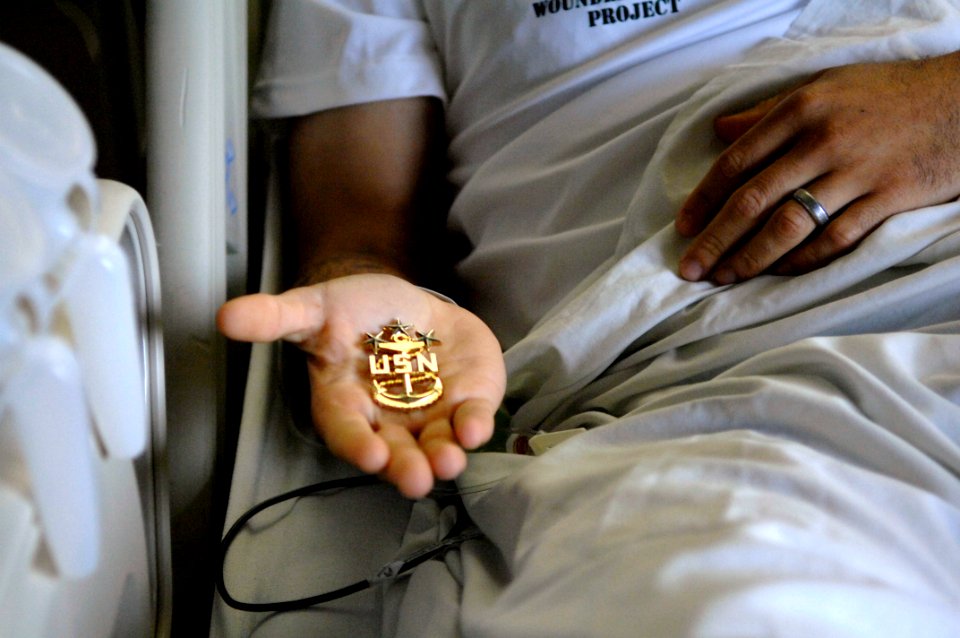 US Navy 100714-N-4930E-034 MCPON presents coins at the National Naval Medical Center