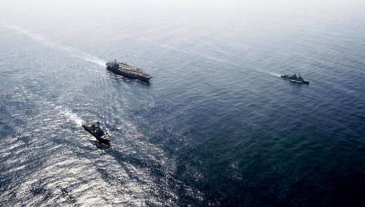 US Navy 100709-N-6003P-171 USS Harry S. Truman (CVN 75), USS Winston S. Churchill (DDG 81) and Jean Bart (D615) cruise in formation after concluding joint air defense interoperability exercises