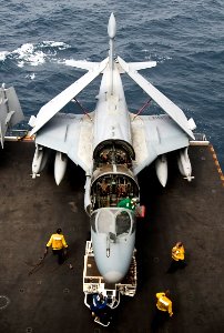 US Navy 100707-N-7317W-019 Sailors move an EA-6B Prowler assigned to Electronic Attack squadron (VAQ) 130 onto an elevator for transport to the flight deck of the aircraft carrier USS Harry S. Truman (CVN 75)