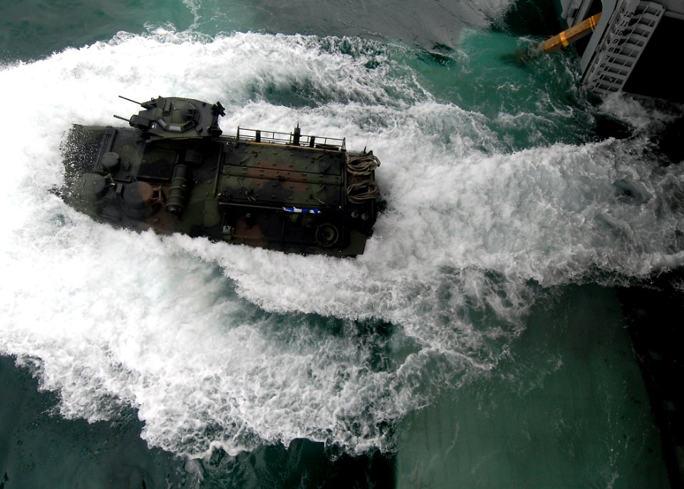 US Navy 100707-N-8283S-119 An amphibious assault vehicle (AAV) launches from the well deck of the amphibious assault ship USS Boxer (LHD 4)