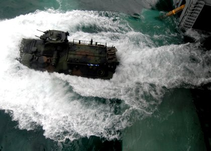 US Navy 100707-N-8283S-119 An amphibious assault vehicle (AAV) launches from the well deck of the amphibious assault ship USS Boxer (LHD 4) photo