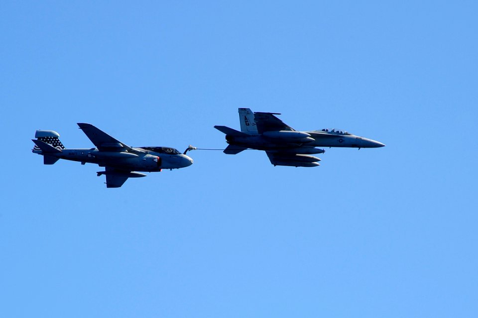 US Navy 100709-N-6604E-124 An F-A-18F Super Hornet assigned to the Jolly Rogers of Strike Fighter Squadron (VFA) 103 refuels an E-A-6B Prowler assigned to the Patriots of Electronic Attack Squadron (VAQ) 140