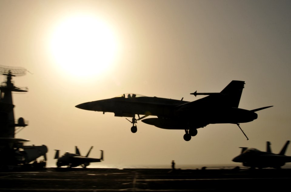 US Navy 100711-N-6362C-242 A Hornet lands aboard USS Harry S. Truman