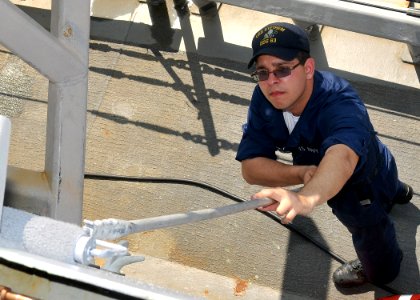 US Navy 100708-N-2013O-007 Sonar Technician (Surface) Seaman Johnny Velazquez, from Chicago, paints an exterior bulkhead during ship preservation efforts aboard the Arleigh Burke-class guided-missile destroyer USS Stethem (DDG
