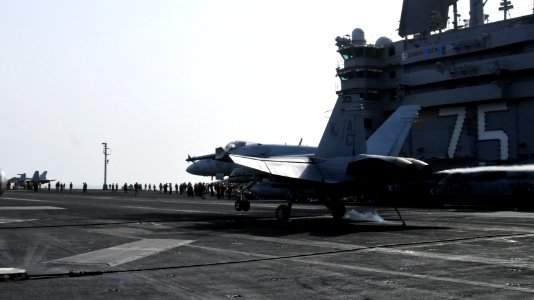 US Navy 100712-N-6362C-221 A Hornet lands aboard USS Harry S. Truman