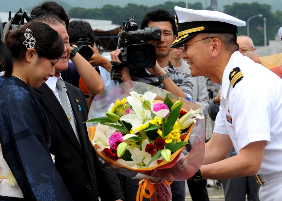 US Navy 100709-N-3215T-131 Cmdr. Jeffrey Kim, commanding officer of the Arleigh Burke-class guided-missile destroyer USS John S. McCain (DDG 56)