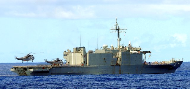 US Navy 100713-N-7058E-050 A Royal Australian Navy Sea King helicopter lands on the aft flight deck of HMAS Kanimbla (L 51)