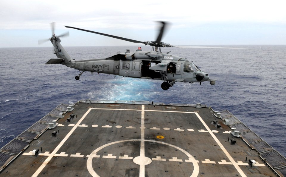 US Navy 100709-N-7058E-109 An MH-60S Sea Hawk helicopter takes off from the flight deck of the littoral combat ship USS Freedom (LCS 1)