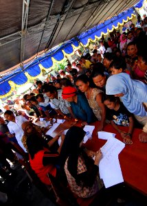 US Navy 100713-N-4044H-135 Patients queue at an engineering civic action program