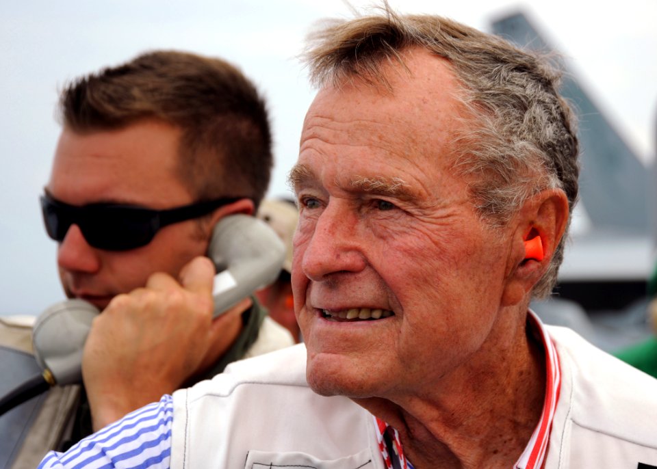 US Navy 100714-N-3885H-211 Former President George H.W. Bush watches flight operations aboard USS George H.W. Bush (CVN 77)