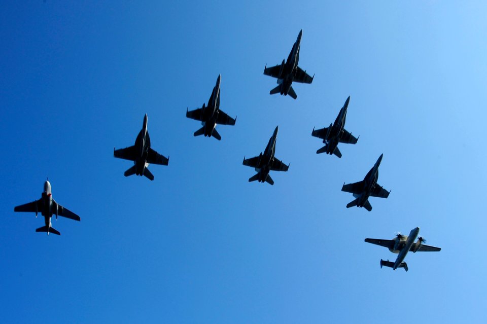 US Navy 100709-N-6604E-372 Aircraft assigned to Carrier Air Wing (CVW) 7 fly in formation during an air power demonstration above the aircraft carrier USS Dwight D. Eisenhower (CVN 69)
