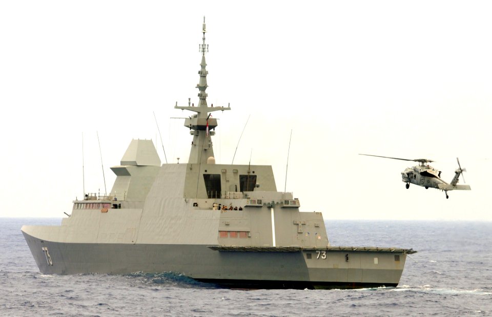 US Navy 100709-N-7058E-148 An MH-60S Sea Hawk helicopter from the littoral combat ship USS Freedom (LCS 1) approaches the Republic of Singapore Navy stealth multi-mission frigate RSS Supreme (73)