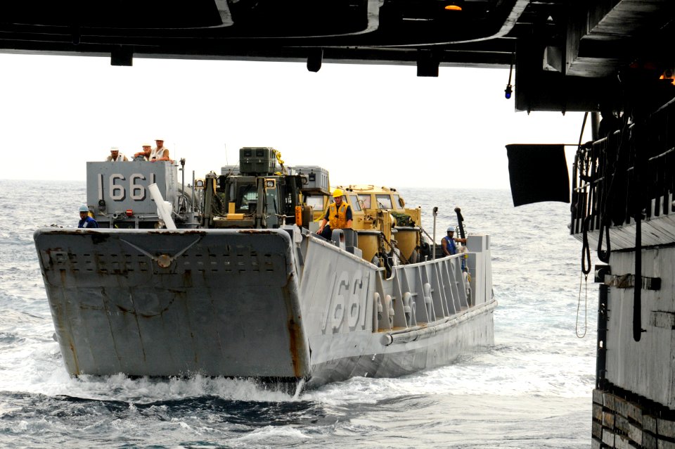 US Navy 100710-N-3154P-074 Landing craft utility (LCU) 1661 enters the well deck of the amphibious transport dock ship USS Ponce (LPD 15). Ponce is underway conducting a training exercise to prepare for an upcoming deployment s