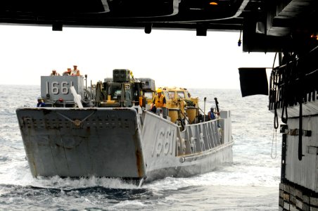 US Navy 100710-N-3154P-074 Landing craft utility (LCU) 1661 enters the well deck of the amphibious transport dock ship USS Ponce (LPD 15). Ponce is underway conducting a training exercise to prepare for an upcoming deployment s