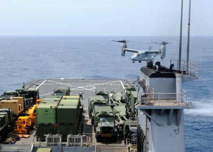 US Navy 100714-N-8069G-145 A Marine Corps V-22 Osprey prepares to land aboard the amphibious dock landing ship USS Carter Hall (LSD 50)