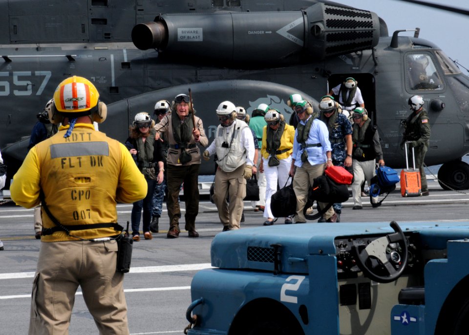 US Navy 100714-N-6509M-084 Former President George H.W. Bush arrives aboard the aircraft carrier that bears his name, USS George H.W. Bush (CVN 77)