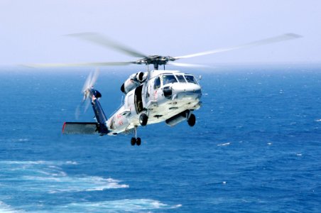 US Navy 100712-N-2918M-035 An SH-60F Sea Hawk helicopter assigned to the Indians of Helicopter Anti-Submarine Squadron (HS) 6 prepares to land aboard the aircraft carrier USS Nimitz (CVN 68)