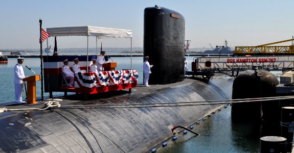 US Navy 100715-N-4047W-002 Capt. Brett Genoble, commander of Submarine Squadron 11, speaks during the change of command ceremony for the Los Angeles-class fast attack submarine USS Hampton (SSN 767)