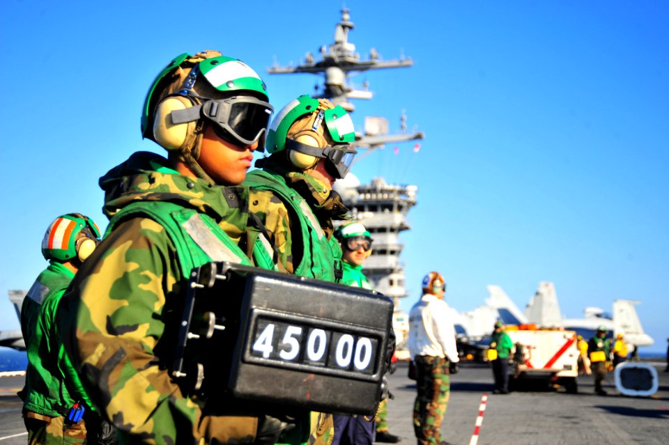 US Navy 100712-N-2953W-405 Sailor confirms weight of aircraft aboard USS Carl Vinson